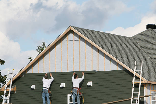 Professional Siding Replacement technician working in Williston Park, NY